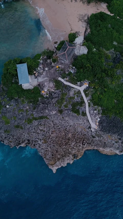 Drone Captures Scenery, Aerial View Showcasing Rugged Shoreline And Lagoon Video stock 324827587