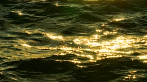 The drone captures the shimmering surface of the water. Stock Footage 307775323