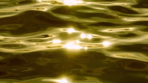 The drone captures the shimmering surface of the water. Stock Footage 307775506