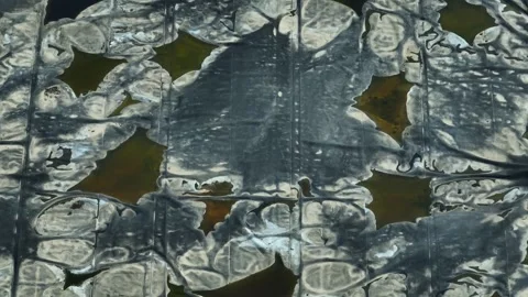 Drone captures signs of potential leakage in industrial waste ponds. Stock Footage 306899561