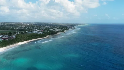 Drone captures soft sea waves and white beach in Bridgetown, Barbados Video stock 136388831