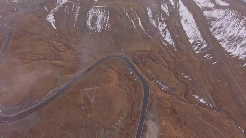 Drone captures Stelvio Pass in fall fog, winding roads, Italy. Stock Footage 321545382