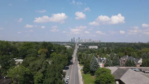 Drone Captures Stunning Landscape with Distant High Rises Stock Footage 295244163