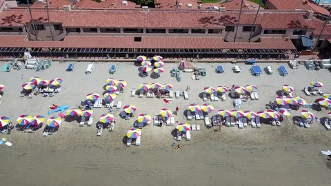 Drone captures sunbathers on a La Jolla beach on a sunny San Diego summer day Stock Footage 97972041