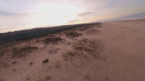 Drone captures tranquil beach at dusk Stock Footage 344543129