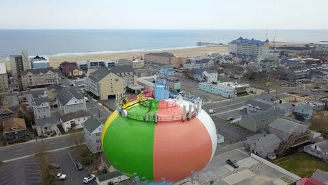 Drone captures water tower and beaches and bays in south Ocean City Maryland Stock Footage 89449487