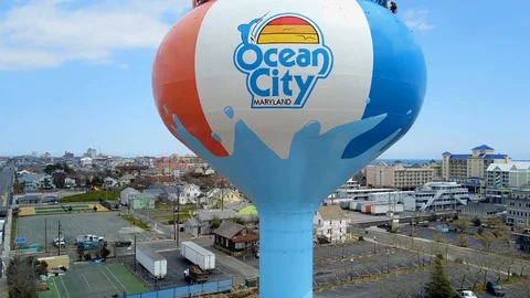 Drone captures water tower and beaches and bays in south Ocean City Maryland Stock Footage 89452395