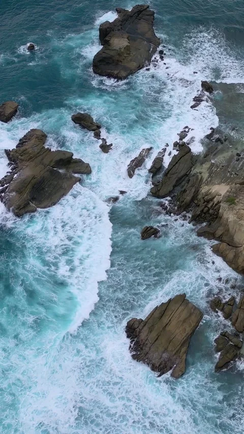 Drone Captures Wild Surf Pounding Rocky Coastal Landscape Strongly Stock Footage 328216659