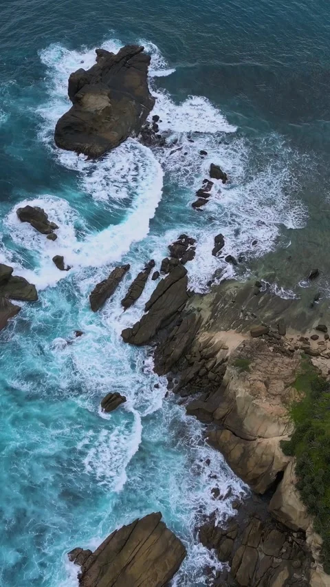 Drone Captures Wild Surf Pounding Rocky Coastal Landscape Strongly Stock-Footage 329282084