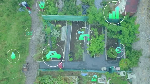 Drone capturing co-gardeners watering and digging garden beds causing eco icons Stock Footage 313094548