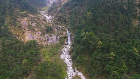 Drone capturing the grandeur of a towering waterfall in North Sikkim. Stock Footage 311389151