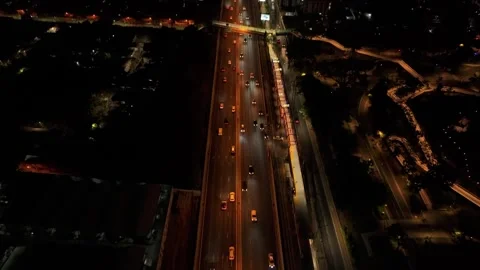 Drone capturing night rush and skyline lights in Bangkok Thailand Stock Footage 306666379