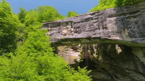 Drone Capturing Stone Bridge Dagestan Russia With Vast Expanses Of Greenery Towe Stock Footage 325920626