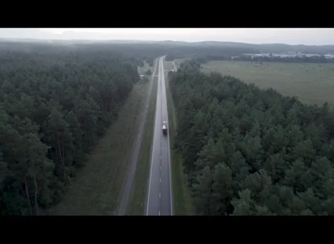 Drone Car Driving On Empty Road Along Sunny Summer Forest 스톡 동영상 243626523