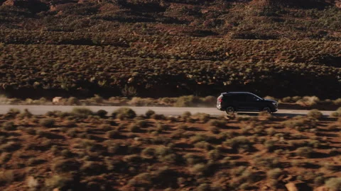 Drone of Car Driving In Utah Stock Footage 320317371