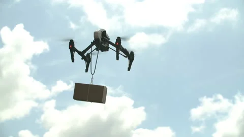 Drone carrying a Parcel Video stock 133202067
