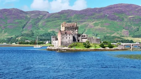 Drone castle Scotland. Eilean Donan castle in Isle of Skye. Historic Travel UK 스톡 동영상 256359993