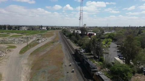 Drone Chasing Cargo Train Vídeos de archivo 238411423