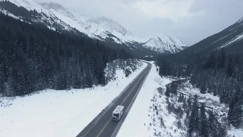 Drone chasing RV crossing the continent in Alberta Video stock 143235080