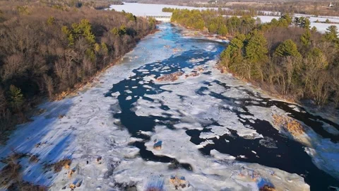 Drone up the Chippewa river at sunset Stock Footage 304806409