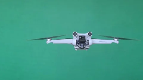 Drone on Chroma key Green screen, Gimbal Top to bottom Stock Footage 250055422