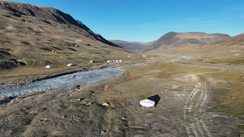 Drone cinematic shot over nomadic ger camp by White Milky River in Altai 스톡 동영상 348400680