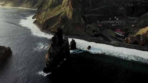 Drone circle around sea stack near Madeira Island Portugal Stock Footage 136114873