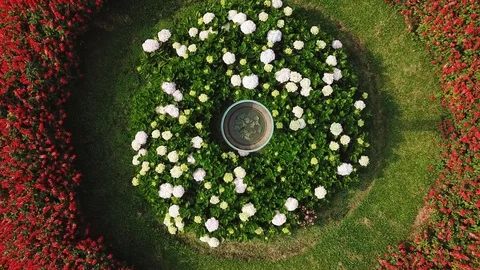 Drone circle flower bed plants park modern lanscape design landmark Vietnam Asia Stock Footage 107139481
