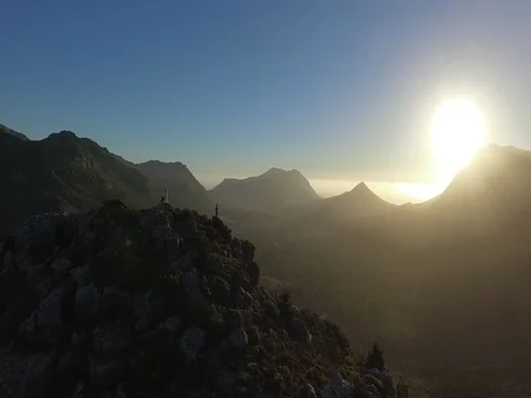 Drone circle shot around mountain with a man standing Video stock 76841204