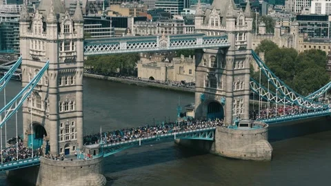 Drone Circles Tower Bridge Left Showing Marathon and City Streets Stock Footage 308519317