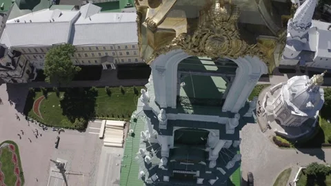 Drone circling and lowering around historic bell tower Stockbeeldmateriaal 332309631