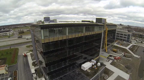Drone circling around building in construction Stock Footage 63939321