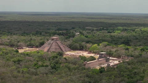 Drone Circling Chichen Itza Ruins with Pyramid and Ball Court in Mexico Stock Footage 310175136