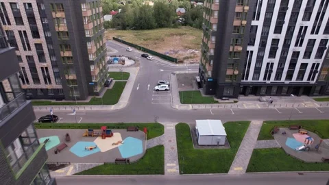 Drone circling residential complex courtyards and buildings Stock Footage 330135722