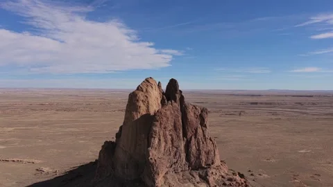 Drone Circular Orbit of a Remote Sci-Fi Outpost Monolith on a Desolate Arid Stock Footage 332546478