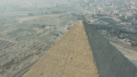 Drone circular rings around the top of Khufu Pyramid, Giza Pyramids Egypt 動画素材 150469298