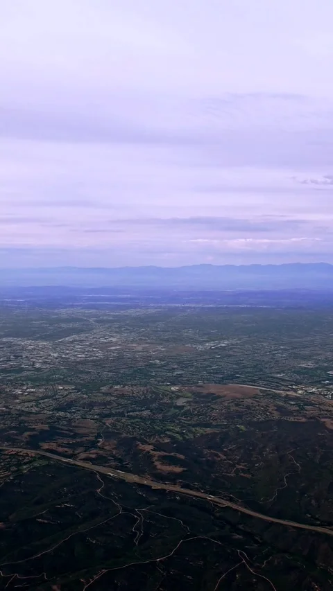 Drone-Like Cityscape from Plane Stock Footage 317893603