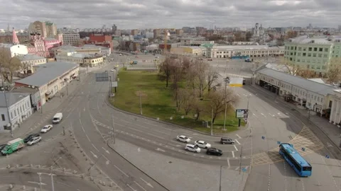 Drone climbing forward above central road network Stock Footage 324677782