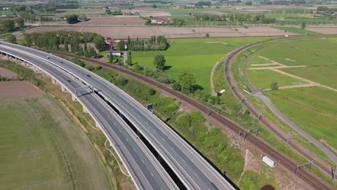 Drone Clip of A11 Cutting Through Landscape near Bruges | FlyLens Aerials Stockbeeldmateriaal 308876250