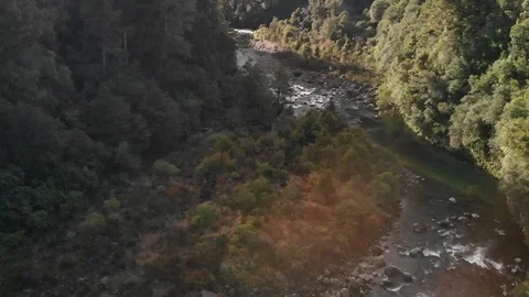 DRONE Clip flying above Remote River Stock Footage