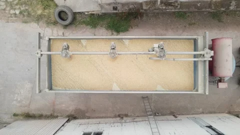 Drone clip of wheat grains drying in industrial truck Vídeos de archivo 332737191