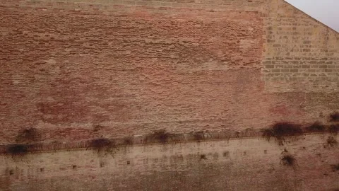 Drone Close-Up of Brick Castle Wall in Italian Village Stock Footage 304843837