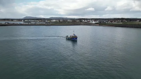 Drone close up fishin boat ruby bay fife scotland Stock Footage 274312843
