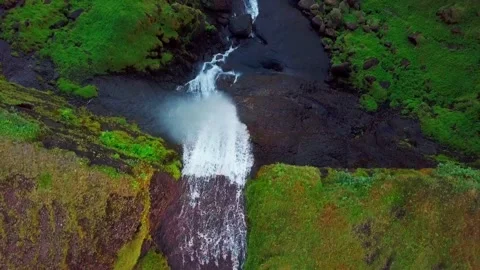 Drone close shot moving above waterfalls in Iceland, 2K Stock Footage 148753308