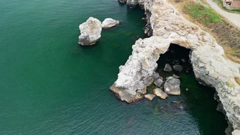 Drone of coast with stone arch cliffs near Tyulenovo village,Black Sea, Bulgaria 스톡 동영상 256030003