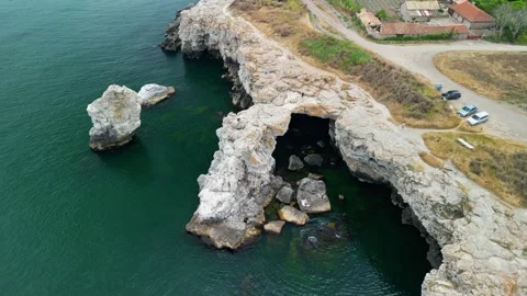 Drone of coast with stone arch cliffs near Tyulenovo village,Black Sea, Bulgaria Stock Footage 256030004