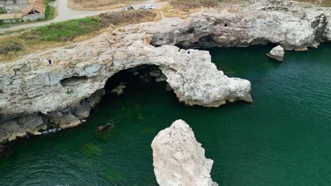 Drone of coast with stone arch cliffs near Tyulenovo village,Black Sea, Bulgaria Stock Footage 256030076