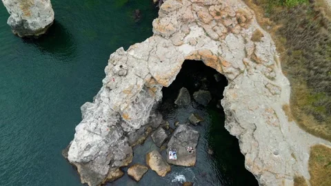 Drone of coast with stone arch cliffs near Tyulenovo village,Black Sea, Bulgaria Stock Footage 256030078