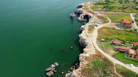 Drone of coast with stone arch cliffs near Tyulenovo village,Black Sea, Bulgaria Stock Footage 256030092