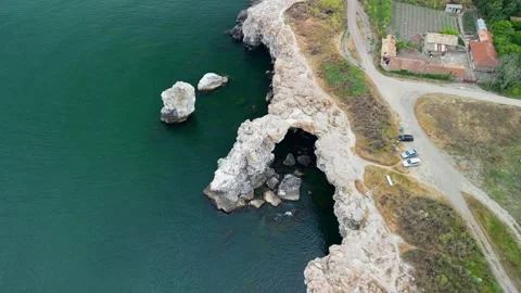 Drone of coast with stone arch cliffs near Tyulenovo village,Black Sea, Bulgaria Stock Footage 256030187